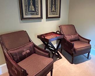 upholstered side arm chairs with elephant motifs by Clayton Marcus