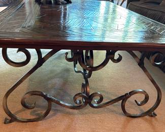 wrought iron base coffee table by Lorts, 36” x 58”