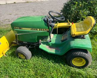 John Deere mower with plow 