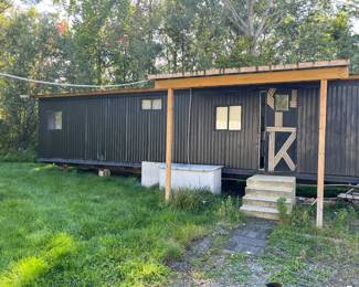 55x12’ trailer. Can be transported by heavy duty truck. 