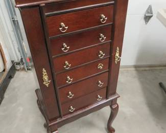 Lot 9: Standing jewelry cabinet 17"W x 41"H x 11"D.is excellent condition