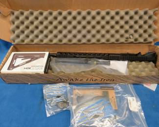 Lot 15: Palmetto State Armory Midlength Nitride 13.5" 5.56 rifle kit with accessories that include a Magpul Carbine stock, buffer tube, trigger assemblies, and more