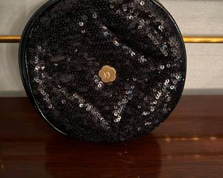 * Small evening bag by Eric Javits