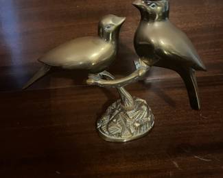 Pair of brass birds on a limb