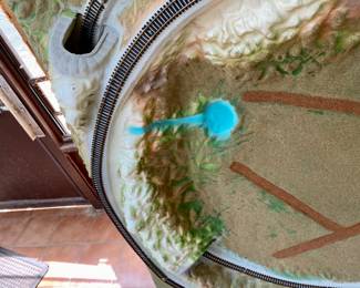 molded train track with tunnel and mountain