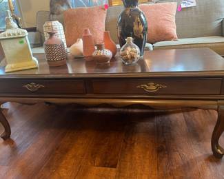 Ethan, Allen Coffee Table, and the two drawers do open and close