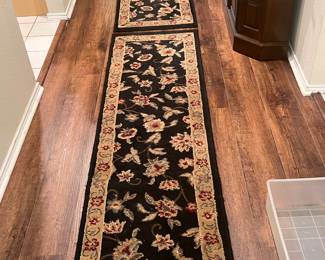 To coordinating rug runners that go back to the round rug you see in the picture before this