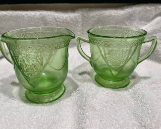 Vaseline glass or uranium glass. These do glow in the dark.!