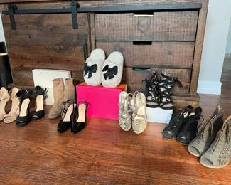 Lots of great shoes. Some look like they have maybe been more than one time. The Kate Spade slippers are new in their original box.!