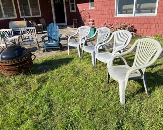 Rubbermaid chairs, Adirondack chair & Couples chairs around patio wood heater