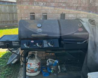 A grill with a smoker