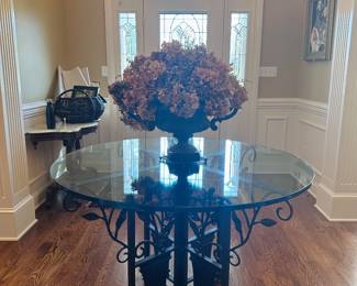 Beautiful high quality iron table with thick study glass top. Lovely floral pattern