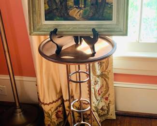 industrial metal and wooden table with original painting by Lucien Keller
