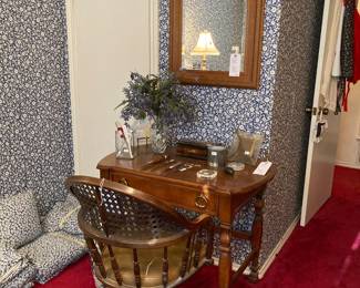 small desk, cane-back desk chair, mirror, etc. 