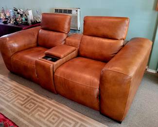 Large leather pair of theater style club chairs ...electric recliners!