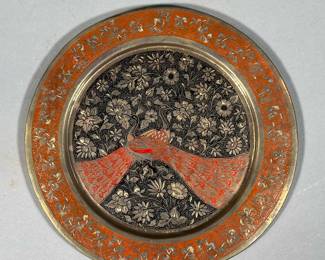 CHASED ENAMELED PEACOCK PLATE | Stylish red-and-black floral decorative enamel plate featuring two engraved and repoussé chased peacocks among flowers. - dia. 8.75 in