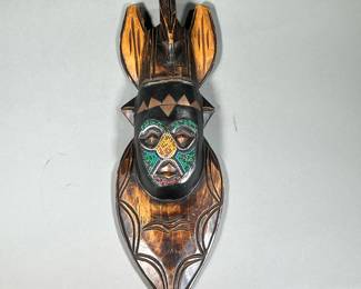 AFRICAN CARVED WOOD MASK WITH BEADWORK | Carved African mask with colorful beadwork on face and inlaid metal on forehead. - l. 6.5 x w. 2 x h. 19 in
