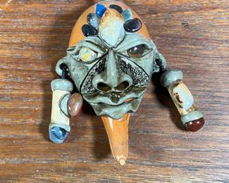 BRAZILIAN CRYSTAL MASK | Small mask made from a hollowed-out gourd, glazed clay, and crystals adorning its eyes, forehead, and earrings. - l. 3 x w. 2 x h. 4.5 in