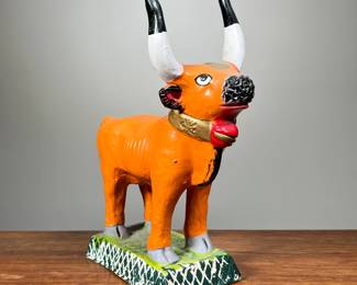 HAND PAINTED CERAMIC BULL | Hand made and hand painted ceramic bull statue, initialed “JC” on bottom. - l. 1 x w. 4.5 x h. 11 in