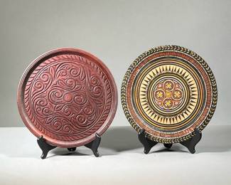 (2PC) CARVED WOODEN PLATES | Two hand carved plates, one with paint decoration. Intricate, swirling designs. - l. 10 x h. 16 in (largest)