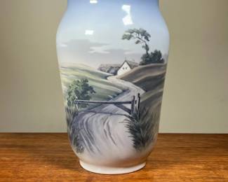 DANISH PAINTED VASE | Depicts countryside scene with river, stamped Royal Copenhagen. - h. 10 x dia. 6.5 in