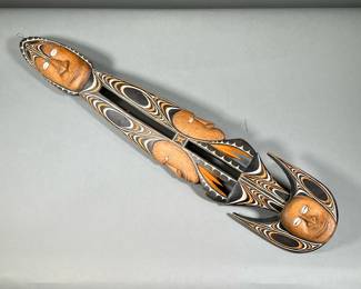 HANGING AFRICAN WOOD CARVING | Double sided carving shows multiple faces all with seashell eyes, hand carved and hand painted. - l. 5 x h. 28 in