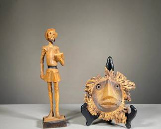 (2PC) CARVED WOOD DECOR | Including a carved wood sculpture of a Don Quixote style figure (h. 13 in.) and a chonta wood roots face carving from Costa Rica (dia. 6.5 in.)