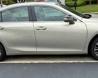 2021 Lexus ES250 AWD Silver over Tan/Black Leather Interior, Automatic, All Wheel Drive, Power Everything. Clean Title and only 6,691 Miles.