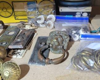 Old table wheels and door knocker