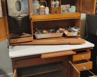 Hoosier cabinet with ironing board
