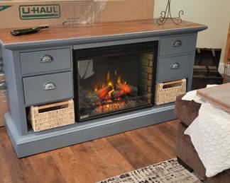 Electric fireplace in cabinet