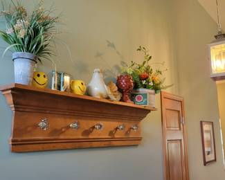 Coat hanger made with antique glass door knobs