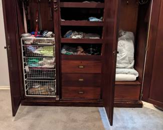 INSIDE OF ARMOIRE CLOSET
