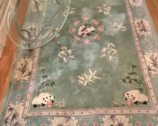 Oriental rug with panda bear motif