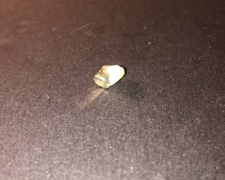 Old tooth with a partial gold crown, guess this would be called an oddity or curiosity?