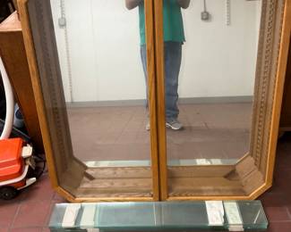 Display case with glass shelves