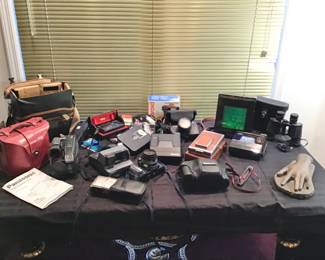 Lots of Cameras Including Polaroids