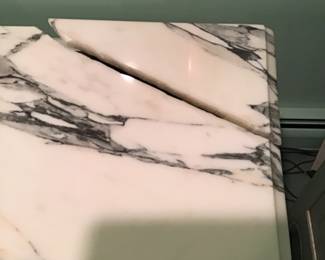 Marble has break to the back corner on the long chest