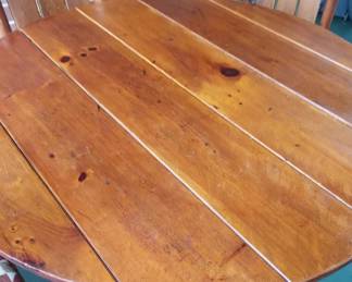 Tabletop detail, Antique rustic pine round kitchen/4 chairs by Deerfield Pinecraft