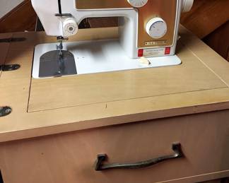Nelco sewing machine in cabinet
