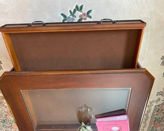 Drawers on each side of the coffee table for storage.