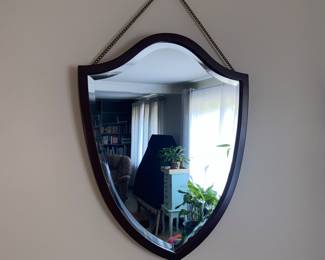 Shield hanging mirror