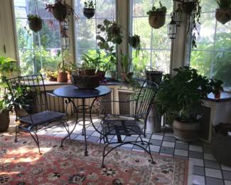 Gardener Room has a Bistro Table, Pair of Iron Chairs and  So Many Pots Made By Various Regional Potters 