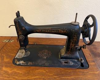 Antique singer design machine with cabinet/table from 1930's