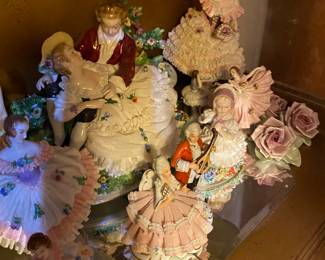 Lace porcelain figurines