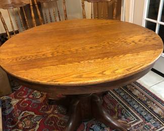 Turn-of -the-century claw foot table.