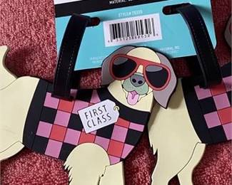 Lot 239   26 Bid(s)
Luggage tags, a pair, dog theme