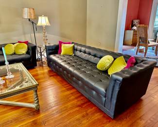 these two vintage black tufted sofas are 92” long each and together they make a great sectional look…..