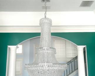 Schonbek Camelot Crystal Chandelier
57 light chandelier
Finish: Polished Silver
60"tall • 34"wide
Weight: 66lbs 
$6,800