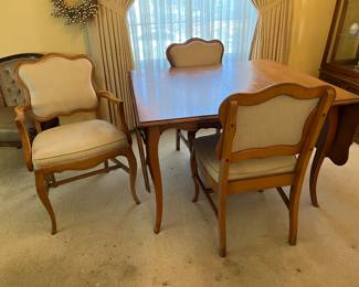 Double drop leaf table with a leaf, (2) captains chairs and (2) side chairs (one captains chair not shown)